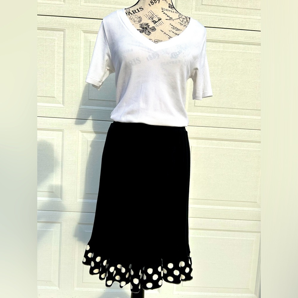 Black skirt with polka dots at the bottom